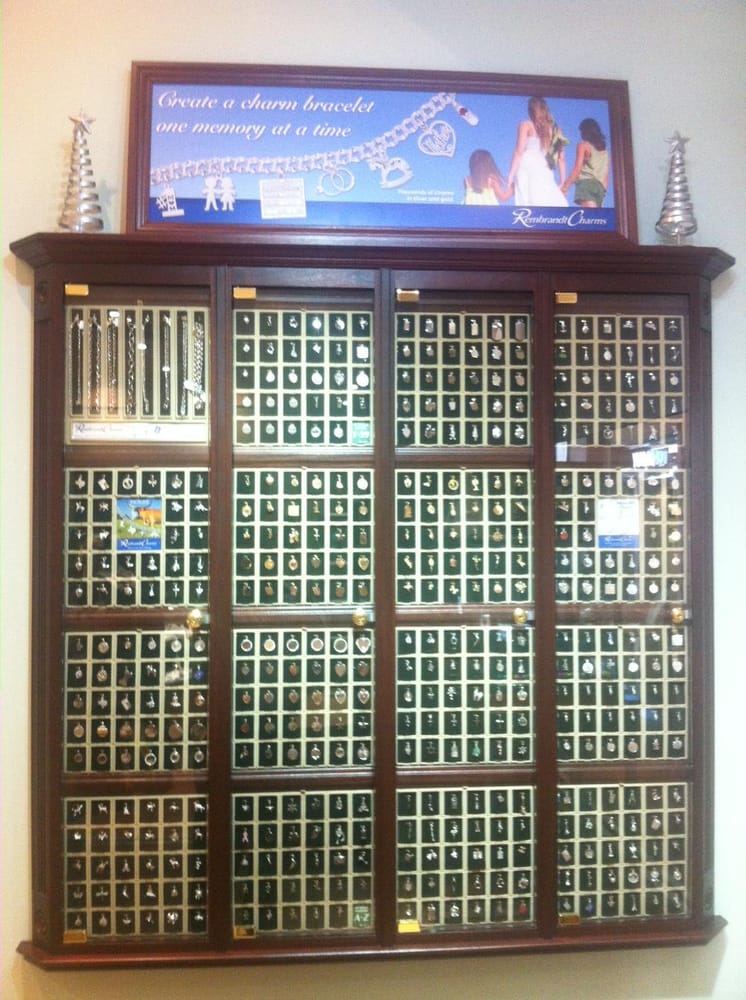 Large cabinet of charms and bracelets 